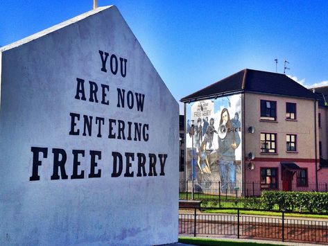 In the Bogside of Derry, Northern Ireland, are a series of murals about The Troubles. In these photos, the Derry murals have remarkable detail and color. Derry Ireland, Ireland Road Trip Itinerary, Northern Ireland Troubles, Northern Ireland Travel, Ireland Aesthetic, Ireland Culture, Backpacking Ireland, Ireland Weather, Derry Girls