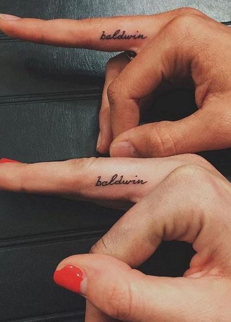 Hailey Baldwin’s 25 Tattoos & Their Meanings | Body Art Guru Small Last Name Tattoos, Tattoo Husband Name, Tattoo Ideas For Husbands Name, Wife Husband Tattoo, Husband Name Tattoos For Women Placement, Husband Name Tattoos For Women Hand, Husbands Name Tattoo Ideas, Husbands Name Tattoo Ideas For Wife, Small Name Tattoos For Women