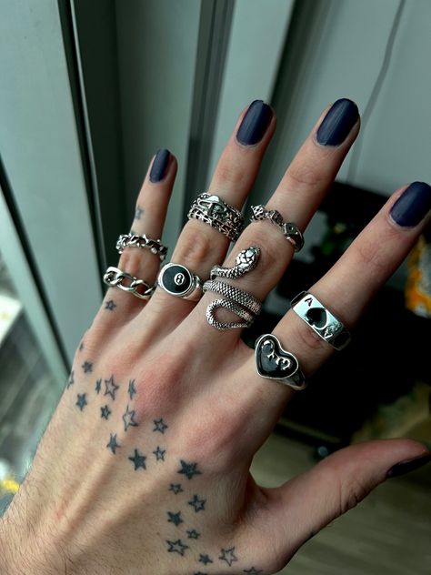 outfit, Instagram, pose, outfit of the day, OOTD, photo shoot, aesthetic, rings, alt, Y2K, silver rings, jewelry, hands, hand tattoo Rockstar Rings Aesthetic, Hand With A Lot Of Rings, Rock Rings Aesthetic, Hand Full Of Rings Silver, Silver Rings On Hand Aesthetic, Black And Silver Jewelry Aesthetic, Silver Jewellery Grunge, Rings Y2k Aesthetic, Hands With Lots Of Rings