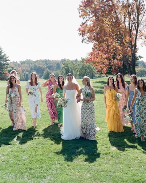 The Art of Mismatched Bridesmaid Dressing, According to an OTM Bridal Stylist - Over The Moon Garden Party Wedding Mother Of The Bride, Floral Bridesmaid Dresses Mismatched Fall, Bridesmaids Wearing Different Colors, Mixed Florals Bridesmaids, Whimsical Bridal Party, Large Bridesmaid Party, Pastel Mismatched Bridesmaid Dresses, Unmatching Bridesmaids, Multi Color Bridesmaid Dresses Summer