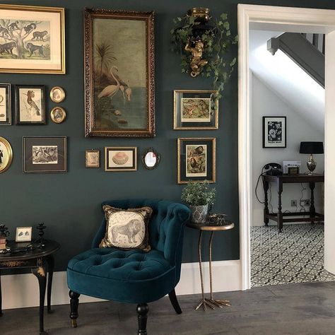 Moody dark walls with white trim - From the @farrowandball Inchyra walls to the @madedotcom bouji… Color Themes Interior Design, Narrow Fireplace Room, Cosmopolitan Living Room, Classic Eccentric Interior, Dark Green Statement Wall, Dark Half Wall Paneling, Vintage Wall Molding, Rooms With Green Sofas, Cozy Dark Academia Living Room