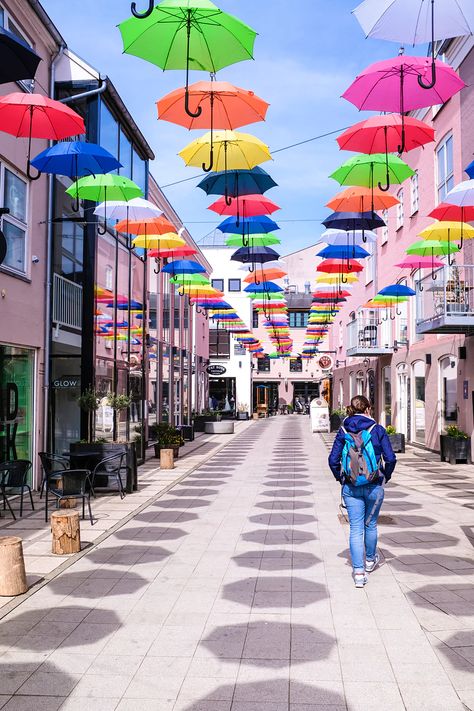 Brightly coloured umbrellas in Vejle, Denmark Aarhus, Vejle, Odense, Umbrella Street, Copenhagen Travel, Denmark Travel, Pedestrian Street, Quirky Art, Mystery Of History