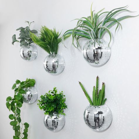 PRICES MAY VARY. Ample Quantity: you will receive a set of 6 pieces of disco ball wall hanging planters with 6 nail hooks; This quantity is sufficient to cater to decoration ideas for multiple rooms or areas, providing considerable options for modelling your desired ambiance, making them an effective way to create a symphony of greenery and vivacity in your settings Disco Ball Design for Unique Decor: the hanging glass planter embodies an awe inspiring disco ball design; It changes the tradition Flower Vase Wall Decor, Bathroom Disco Ball, Hanging Bedroom Decor, Eccentric Wall Decor, Disco Ball Florals, Disco Ball Bathroom Decor, Disco Room Ideas, Disco Ball Halloween Decor, Bathroom Decor Neon