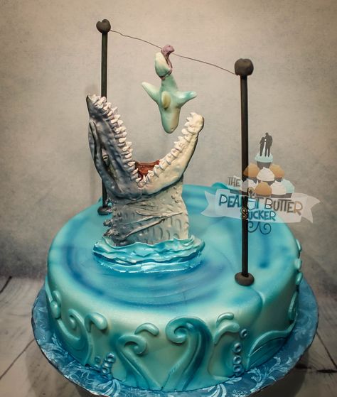 Jurassic park water birthday cake Mosasaurus Birthday Party, Mosasaurus Cake, Jurassic World Cake Ideas, Jurrasic World Cake, Water Birthday Cake, Jurrasic Park Cake, Jurassic World Birthday Cake, Jurassic Park Birthday Cake, Fête Jurassic Park