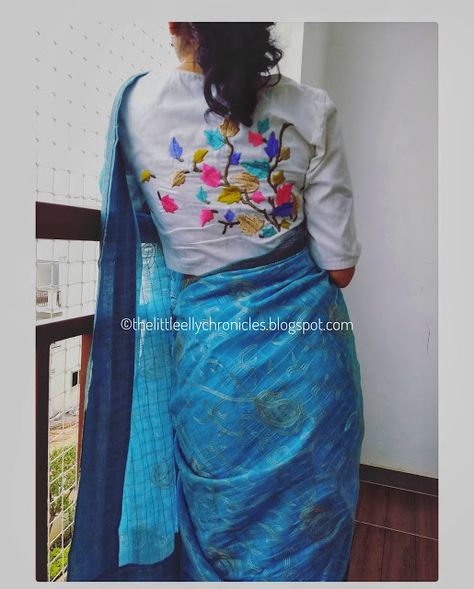An embroidered white blouse paired with a blue cotton saree Haute Couture, Couture, Lenin Saree Blouse Designs, White Blouse Designs, Cotton Blouse Design, Cotton Saree Blouse Designs, Cotton Saree Blouse, Saree Blouse Neck Designs, Blouse Back Neck Designs