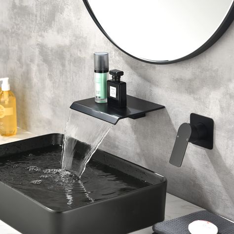 Minimalist design and smooth, modern lines come together in this wall-mounted bathroom sink faucet. Made of brass and SUS304 stainless steel, the kit has a sleek look, durability and reliability, and requires two tap holes for installation. Waterfall Sink Faucet, Bathroom Sink Faucets Waterfall, Aesthetic Bath, Bathroom Faucets Waterfall, Waterfall Bathroom, Aesthetic Bathroom, Wall Mount Faucet Bathroom, Wall Mounted Bathroom Sink, Faucet Design