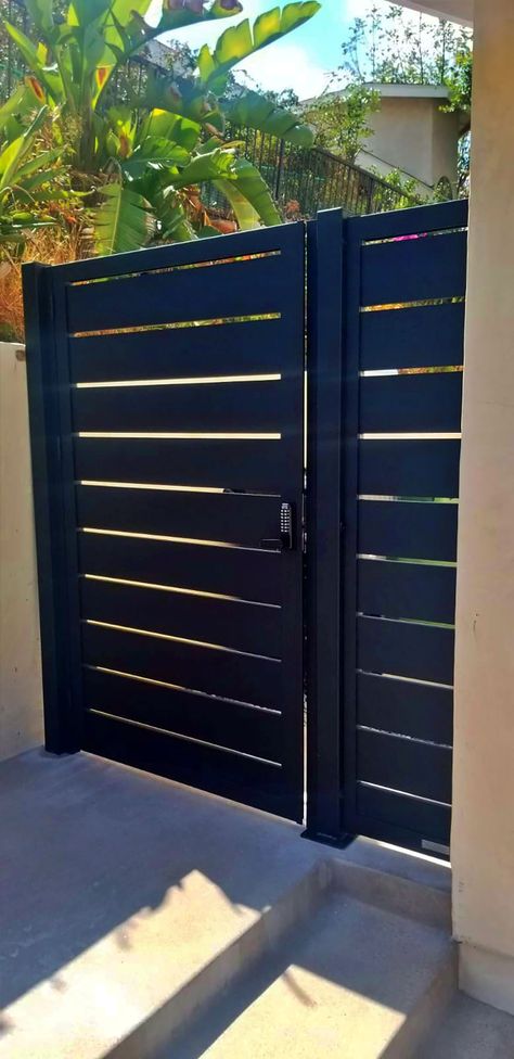 Black Aluminum Entry Gate | MulhollandBrand.com Side Gate Doors, Back Gate Ideas Entrance, Metal Side Door Gate, Black Aluminum Fence Gates, Side Door Fence Gate Ideas, Outdoor Gate Door, Iron Side Gate Ideas, Modern Fence Door, Metal Backyard Gate