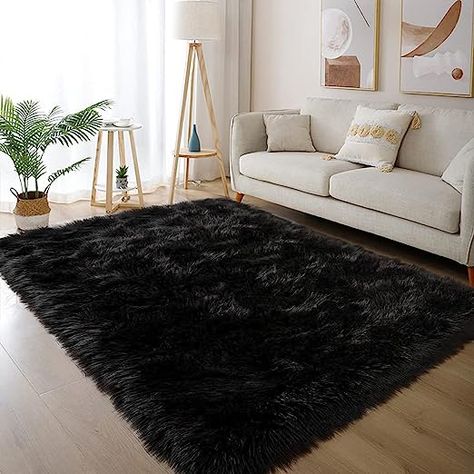 【Material and Dimension of Rug】Made of 100% faux sheepskin fur. Approx 59in. x 79in. It is good choice for bedroom rug, living room rug, kid's room, dorm rug, etc. 【Upgraded Area Fur Rug】 Featuring incomparable softness and irresistible touch of this faux fur rug, excellent elasticity ensure that the fur rug has excellent texture and fluffy, enjoy the like real sheepskin feeling underfoot. 【Durable and Fade Resistant】This fur rug is designed for long lasting use, rug is constructed with thick pl Santo Domingo, Black Faux Fur Rug, Black Rug Bedroom, Luxury Room Decor, Fuzzy Rug, Dorm Rugs, Faux Sheepskin Rug, Bed Rug, High Pile Rug