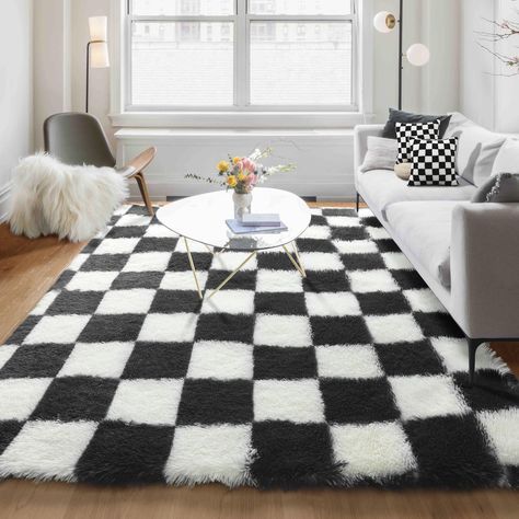 PRICES MAY VARY. Modern Design -- KICMOR black and white rug design is inspired by Checkerboard (date back to the 15th mid-century). It's a classic style that never goes out, perfect for creating aesthetic and elevate your space. If you want to add a touch of personality to your room and impress your guests, our stylish checkered area rug would be a ideal choice. Ultra Soft Fluffy Rug -- Feels like stepping on a fuzzy cloud! Our shag rug is made of microfiber and spongy interlayer, and the shagg Black White And Red Living Room, Rugs For Boys Bedroom, Black And Grey Apartment Decor, Dark Rug Bedroom, Dorm Rugs College, Edgy Living Room Decor, Black And White Striped Bedroom, Apartment Decorating On A Budget Living Room, Checker Carpet