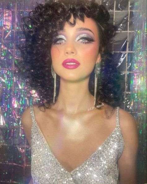 Top 10 Timeless 70s Glam Makeup Looks To Step Back In Time 70s Makeup Look Disco Purple, Retro Hair And Makeup Looks, Caribbean Formal Outfit, 70s Makeup Disco Glitter, 70s Disco Makeup Silver, Vintage 70s Disco Dress, 70’s Makeup Disco, Glam Disco Makeup, Roller Disco Makeup