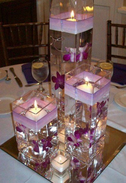 Floating Candles With Sand, Fairy Light Centerpiece Wedding, Inexpensive Wedding Flowers, Purple Wedding Centerpieces, Floating Candle Centerpieces, Tafel Decor, Table Lighting, Diy Centerpieces, Candle Centerpieces