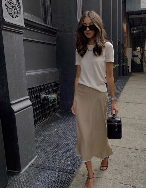 White T Shirt With Skirt, Beige Silk Skirt Outfit Summer, Minimal Feminine Outfit, Slip Dress And Shirt, Taupe Satin Skirt Outfit, Spring Silk Skirt Outfit, Silk Beige Skirt, Silk Slip Skirt Outfit Summer, Slip Skirt Office Outfit