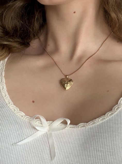 heart locket necklace #necklace #jewelry #coquette #hyperfeminine #oldmoneyaesthetic #white #shein #newpost #like #follow #instagram #tiktok #lanadelrey #lilyrosedepp Gold Jewelry Coquette, Good Heart Locket, Heart Locket Outfit, Coquette Heart Necklace, Downtown Jewelry Aesthetic, Shein Heart Necklace, Coquette Gold Jewellery, Old Locket Necklace, Shein Jewelry Aesthetic