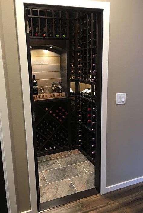 Wine Closets - Convert a Closet or Staircase Today Simple Wine Cellar Ideas, House Wine Cellar Ideas, Wine Room Door Ideas, Wine Closets Ideas, Winery Closet, Small Closet Wine Cellar Ideas, Liquor Closet Ideas, Wine Rooms In House, Home Wine Cellars Small