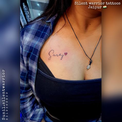 Initial Tattoo On Chest Women, Chest Tattoo Name Female, Sunil Name Tattoo, Name Tattoo Chest Women, Name Tats Tattoo Ideas, Boyfriend Name Tattoos For Women Chest, Name On Chest Tattoo Female, Husband Name Tattoos For Women Hand, Name Tattoos For Women Chest