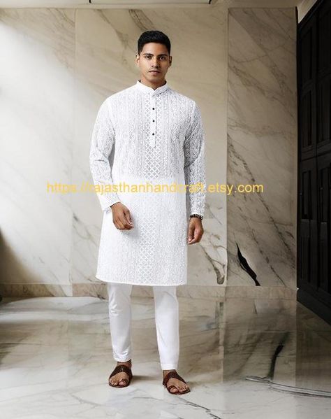 Department : Boy , Men or Adult  Fashion : wedding kurta embroidered chikankari kurta Color : White Material : Chikankari High-grade premium embroidered tunic Description This Kurta is By Rajasthanhandcraft. It Is Made From Chikankari  Embroidered Material and finished in White Color. It is typically made of lightweight and breathable fabric . The kurta is designed for comfort while retaining an elegant and traditional look.Depending on the design and occasion, the kurta may feature various embe Kurta Wedding, Wedding Kurta, Chikankari Kurta, Kurta Men, Fashion Wedding, Embroidered Tunic, Big And Tall, Ganesha, Favorite Things Gift