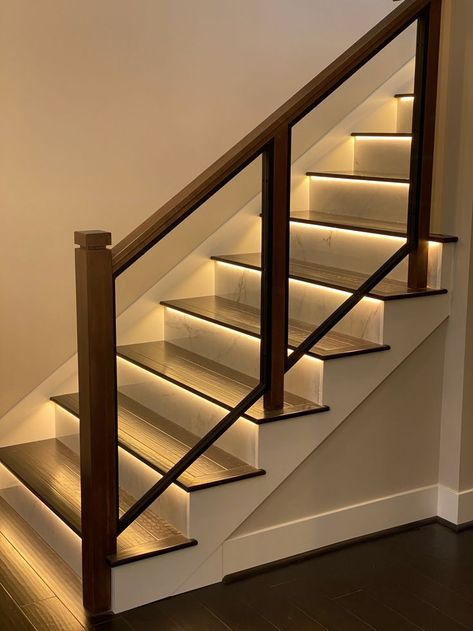 This stunning custom glass system with marble risers, LED lights, and a wood handrail will create an elegant & modern look in any new home or remodel. 
•
•
Visit Brookfield Stairs and talk with our talented team of designers to help you create the look of your dreams! Brookfieldstairs.com
•
•
#glass #metal #customrailings #hardwoodhandrail #cleanandmodern #stairdesign #brookfieldstairs #moderncontemporary #unique #modern #stylish #architecture #staircase #interior #design #photography #interior Stair Marble Design, Architecture Staircase, Reling Design, Modern Staircase Railing, Staircase Interior, Glass Staircase Railing, Glass Railing Stairs, Glass Handrail, Staircase Interior Design