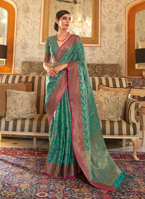 There is no meaning of Indian fashion without the eternally graceful south silk saree! If one talks about sarees in India, south silk saree online will definitely be on top of the must-have list. This sea green south silk saree with price have glorified Indian clothing more than any other silhouette. India is a land of silk with diverse types of silk fabrics which is beyond anyone's imagination. The unstitched blouse can be customised upto 44 inches. Do Note: All the accessories shown are for styling purpose only. Slight color variation may occur due to photographic reasons. Fall and Pico : Done Drapping Saree(Ready to wear) : On Request Extra Charges Occasion : Wedding Wear, Party Wear, Festive Wear, Engagement Wear, Traditional Wear Includes : 1 Saree, 1 Blouse Saree Length : 5.5 meter B Indian Designer Sarees, Designer Sarees Collection, Party Kleidung, Green Saree, Blue Saree, Embroidery Saree, Trendy Sarees, Art Silk Sarees, Tussar Silk Saree