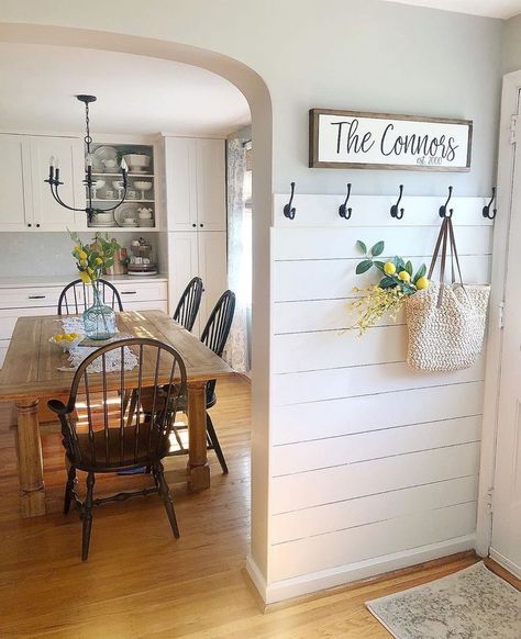 A new farmhouse trend is a half-wall with shiplap on it. This entryway looks incredible, and I’d love to see this in your home! Would you put this in your home? If not, what other  design trend would you rather have in your home?   #newlisting #justlisted #knoxvillehomesforsale #forsale #knoxvillehomes #knoxvillelistings #knoxvilleproperties #knoxvillerealtors #knoxvillerealestate #househunting #moveinready #homeforsale #ThePriceIsRight Entryway Wall Hanger, Small Entry Way Mud Room Ideas, Kitchen Entry Wall Decor, Front Door Room Ideas, Ideas For Small Entry Ways Entrance, Front Door In Kitchen Entryway, Shiplap With Hooks Entry, Kitchen By Entryway, By The Door Decor Entryway