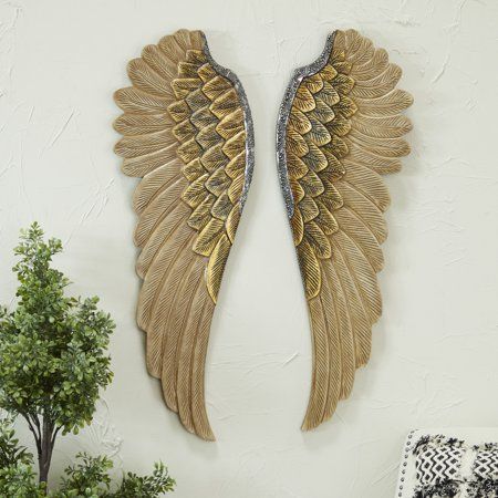 Create a balanced space in the most creative way with this expertly crafted wall decor for captivating focal point. Showcase your personality and turn your walls into an art gallery with this captivating wall decor. This impressive wings wall decor can be a focal point and have a big, positive impact on your homes interior design. This item ships in 1 carton. Item comes with keyhole hooks at the back for easy and secure hang; nails and screws are not included. Suitable for indoor use only. Made Decor With Gold Accents, Wings Bird, Angel Wings Wall Decor, Modern Farmhouse Wall Decor, Wing Wall, Angel Wings Wall, Elegante Y Chic, Wooden Wall Plaques, White Wall Decor