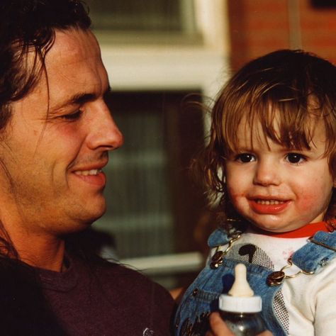 Classic photo of WWE Hall of Fame legend Bret "The Hitman" Hart holding his youngest son Blade Colton Hart (1990) when he was a toddler. #WWE #WWEHOF #wwefamilies #wwekids #hartfoundation #hartfamily #wrestling #wrestler Bret The Hitman Hart, Billy Gunn, Bret Hart, Hitman Hart, Wwe Hall Of Fame, Classic Photo, Tna Impact, Wwe Legends, Hall Of Fame