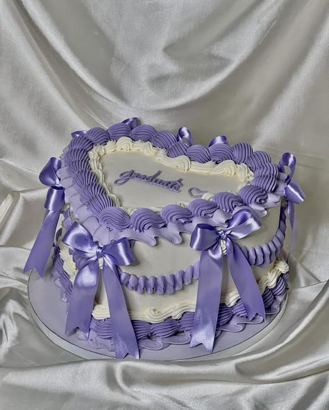 I’m obsessed with this one!!! . . . . . . . . #cake #cakecakecake #graduation #unccharlotte #clt #cltfood #cltbaker #buttercreamcake #cltinfluencer #explorepage✨ #explore #cltcakes #cakedesign #birthdaycake #purplecake Vintage Cake Purple, Purple Vintage Cake, Purple Heart Cake, Cake With Bows, Vintage Style Cake, Heart Shaped Birthday Cake, Heart Birthday Cake, Violet Cakes, Icing Ideas