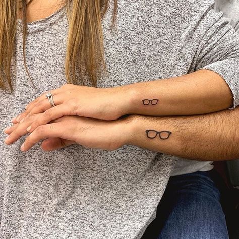 Matching Tattoos For Couples, Couple Tattoo Ideas, Tattoos For Couples, Faith Tattoo On Wrist, Glasses Tattoo, Best Couple Tattoos, Roman Numeral Tattoos, Matching Sister Tattoos, Hamsa Tattoo