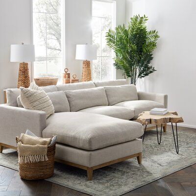 A sectional sofa with comfort and style in one high-end design features a double row of softback cushions and impeccable wood detailing. This modern sectional seats three and fits the various room and design styles. Designed with a solid oak frame, a durable and easy to clean linen blend fabric, and removable and reversible cushions, this living room sectional will last for years to come. | Joss & Main Toronto Chase Sectional Brown 35.0 x 110.0 x 74.0 in | C004866749 | Wayfair Canada Sectional Sofa With Chaise Living Room, Beige Sofa With Chaise, Left Chaise Sectional Sofas, Chase Sectional Living Room, Living Room Sectional Sofa Layout, Japandi Living Room Sectional, Chaise Longue, White Sofa With Chaise, Sofas With Chaise