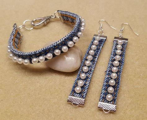 Denim seams and pearls. Denim Jewelry Bracelets, Denim Recycling Ideas, Recycled Denim Jewelry, Earrings Made From Recycled Materials, Blue Jean Jewelry Diy, Jean Upcycle Diy Clothes, Beaded Jeans Diy, Denim Accessories Diy, Denim Earrings Diy