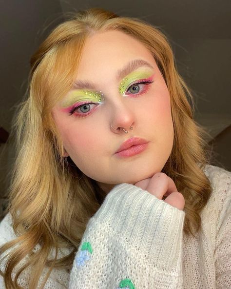 pink and green eyeshadow with rhinestones and full coverage foundation Green Pink Eyeshadow Looks, Green And Pink Makeup Ideas, Pink Green Makeup Looks, Portals Concert Makeup, Fairy Makeup Pink And Green, Pink And Green Eyeliner, Pink Green Eye Makeup, Green Pink Eye Makeup, Abba Inspired Makeup