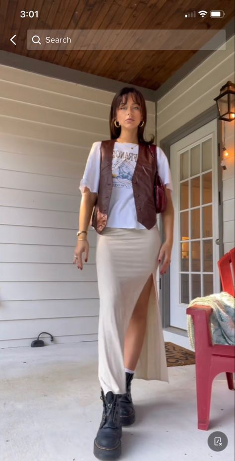 Womens Cream Dress, Vest Midi Skirt Outfit, 70’s Maxi Skirt, Leather Vest Outfits For Women Fall, Preppy Street Style Summer, Fashion Inspo Big Bust, Leather Vest With Dress, Brown Doc Martens Outfit Summer, Docs Skirt Outfit