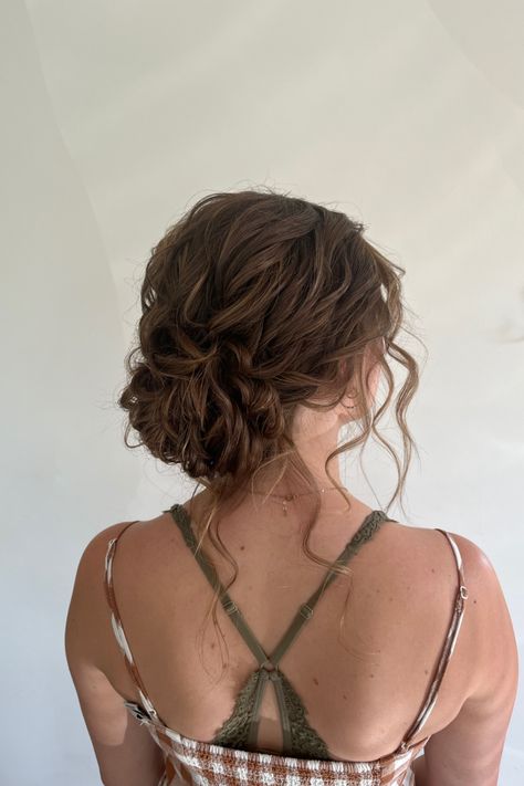 Loose Curly Updo Wedding Low Buns, Messy Bun Hairstyles Formal, Low Updo Curly Hair, Low Messy Bun Prom Hair, Braided Bun Prom Hair, Low Messy Bun Wedding Hair Loose Curls, Messy Low Bun Formal, Messy Low Updo Wedding, Prom Hair Messy Bun