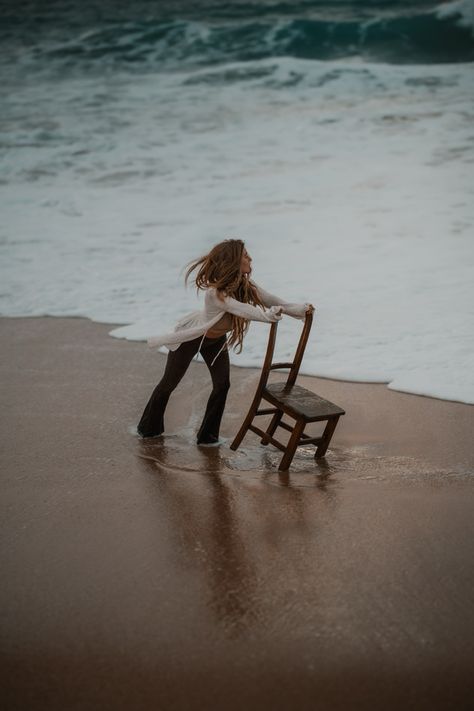 Beach sunset shooting with a chair Chair On The Beach Photoshoot, Beach Chair Photoshoot, Sea Photography Ideas, Beach Chair Poses, Photoshoot Chair, Chair Poses, Sunset Horizon, Winter Shoot, Beaches Film