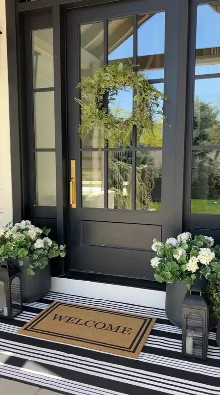 Front Door Staging, Front Porch Decorating Ideas Farmhouse, Luxury Front Door Entrance, Greenery Front Porch, Black And White Front Porch, Faux Plants For Front Porch, Entryway Decor Modern Luxury, Outdoor Entryway Ideas, Foyer Entryway Ideas