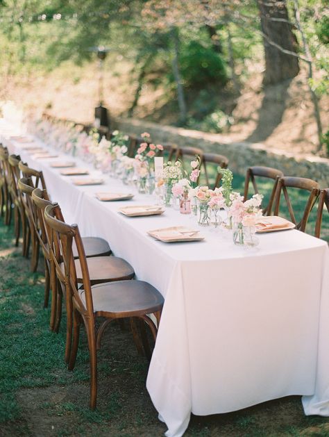 120 blush bud small vases down long farm table by San diego wedding florist tiny victories at sacred mountain julian ethereal garden wedding elegant vibes White Bud Vases Wedding Long Table, Potted Flowers At Wedding, Bridal Shower Long Table, Bud Vases On Long Table Wedding, Bud Vase Long Table Wedding, Long Table Bridal Shower Decor, Head Table Bud Vases And Candles, Small Vase Table Decorations, Garden Wedding Long Table