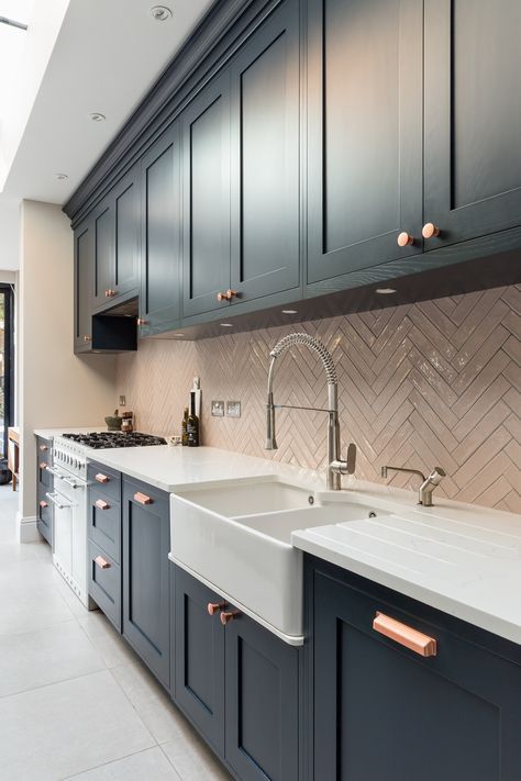 This Shaker-style kitchen has modern influences and accents of bright colour, such as the pink herringbone splashback and achieves a warm, English style with a modern Scandinavian design twist #kitchendesign #kitcheninspo #kitchendecor Farmhouse, Kitchen With Marble, Marble Worktops, Shaker Style, Farmhouse Kitchen, Kitchen Remodel, Dream House, Marble, Navy Blue