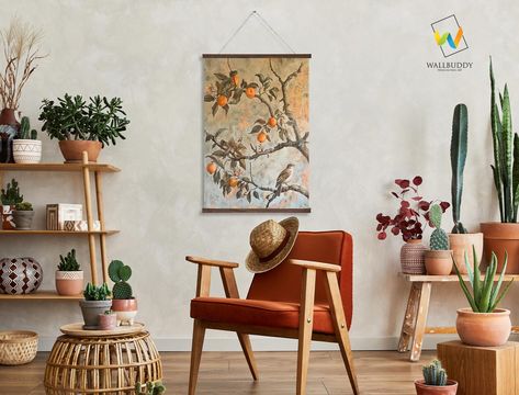 This wall hanging captures the serene beauty of nature with a vintage-inspired depiction of a bird perched on the branch of an orange tree. The rustic tones and intricate details create a timeless piece that adds a touch of natural elegance to any room, making it perfect for those who appreciate botanical art and vintage charm. The soft, muted colors and weathered texture evoke a sense of calm and tranquility, enhancing the warmth and coziness of your home decor. Rustic Nature-Inspired Design: T Design