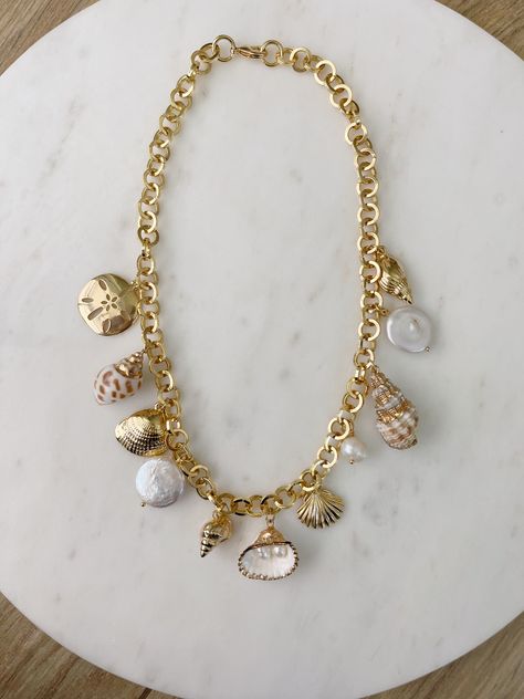 Elevate your outfit with these jewelry this 2023. Seashell Gold Jewelry, Summer Gold Necklace, Seashell Charm Bracelet, European Summer Jewellery, Gold Charms For Necklace, Chunky Gold Charm Necklace, Summer Charm Necklace, Chunky Gold Jewelry Aesthetic, Gold Summer Jewelry