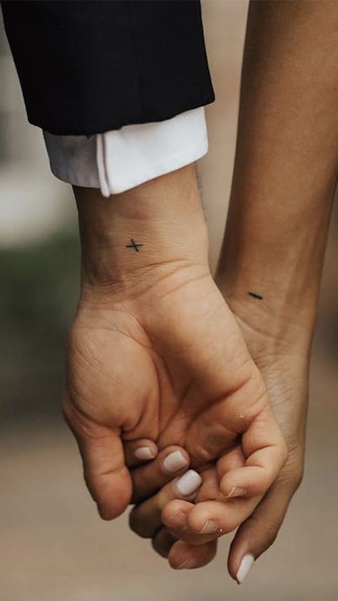 Holding Hand Tattoo Couple, Small Tattoos Husband And Wife, Tiny Matching Couple Tattoos, Magnet Tattoo Couples, Fine Line Couple Tattoo Ideas, Lowkey Matching Couple Tattoos, Small Finger Tattoos For Couples, Matching Relationship Tattoos Couple Tat, Discrete Couple Tattoos