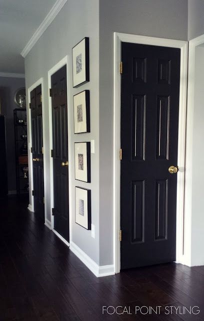 Entryway With Black Door, Front Door With Black Hardware, Dark Doors With White Trim, Black Door White Trim, White Walls Black Trim, Modern Bedroom Door Design, Modern Bedroom Door, Paint Interior Doors, How To Paint Interior Doors