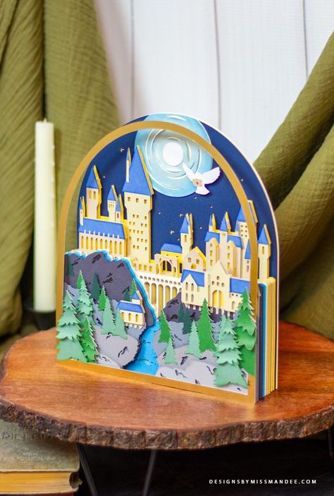 FREE Layered Hogwarts Castle – Shadowbox Cut File - Designs By Miss Mandee. Back to School, back-2-school, castle, craft, crafting, Cricut, cut file, forest, free, freebie, gift, Halloween, Harry Potter, Hogwarts, layered, Layered Hogwarts Castle, owl, paper art, papercraft, party, shadowbox, Shadowbox art, Shadowbox Cut File, silhouette. Cricut, Hogwarts, Harry Potter, Owl Paper, Hogwarts Castle, 3d Svg, Castle