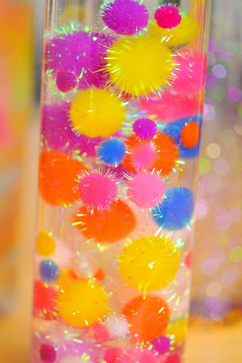 Preschool Sensory Bottles Diy, Sensory Calming Bottles, Pompom Sensory Bottle, Water Bottle Glitter Sensory, Cool Sensory Bottles, Diy Sensory Tubes, Make Your Own Sensory Bottles, Infant Sensory Bottles, Emotion Sensory Bottles