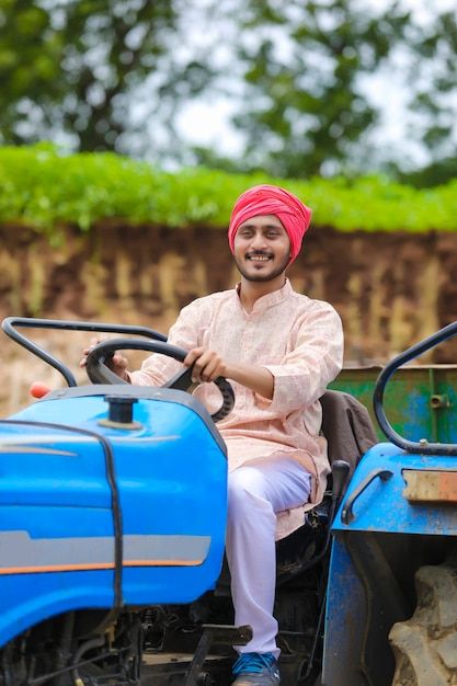 Technology and people concept, portrait ... | Premium Photo #Freepik #photo #agriculture-tractor #farm-tractor #agricultural-machinery #tractor Indian Farmer, Tractor Photos, Agriculture Tractor, Agricultural Machinery, 50 Million, Farm Tractor, Smile Face, Premium Photo, Agriculture