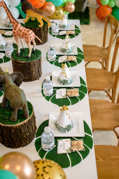 Wild One Safari Birthday - Pretty My Party - Party Ideas Jungle Fourth Birthday, Dino Safari Birthday Party, Boho Zoo Birthday, Jungle Birthday Favors, Tropical Safari Birthday Party, Lion Birthday Party Ideas Decoration, The Wild One Birthday Party, Safari First Birthday Party Boy, Safari Tablescape