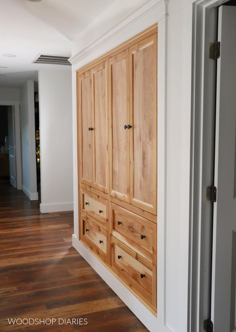 Learn how to turn a basic closet into custom built ins with this tutorial. Make your storage functional with hallway closet built ins. Hallway Closet Ideas Storage, Closet Into Shelves Built Ins, Entryway Built In Ideas Storage Cabinets, Wardrobe Coat Closet, Built In Storage Hallway, Built In Storage Cabinets Hallways, Custom Wall Closet Built Ins, Coat Closet Cabinet Ideas, Shallow Hall Closet