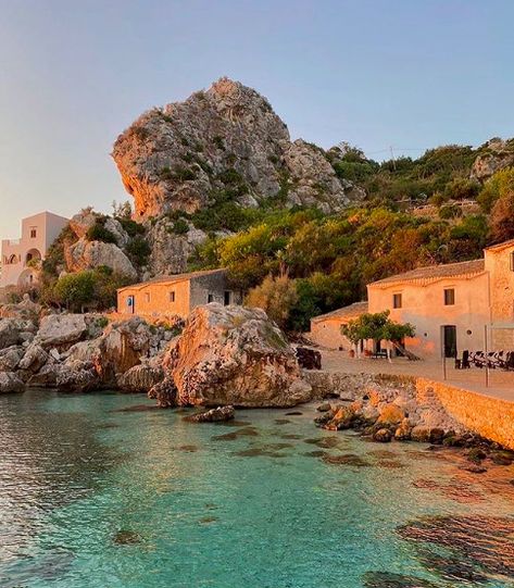 Tonnara di Scopello is nestled in a bay of incomparable beauty, representing the ancient history of the Sicilian sea and traditions. It’s the perfect place for those who wish to get away from the daily troubles and immerse themselves in an incredible atmosphere made of history and wonderful nature. (via http://www.latonnaradiscopello.it/en/) photo by @_giacomosonzini Sicily Italy, Italy Sea, Mediterranean Aesthetic, Italy Beaches, The Beach People, Europe Aesthetic, Water Aesthetic, Summer Story, Italy Aesthetic