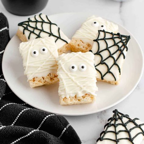 Cake Pops, Tombstone Rice Krispie Treats, Wednesday Rice Krispie Treats, Rice Krispy Halloween Ideas, Halloween Dipped Rice Krispie Treats, Rice Crispy Mummies, Halloween Chocolate Rice Krispie Treats, Halloween Dessert Rice Krispies, Mummy Rice Crispy Treats