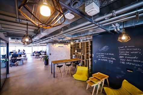 Facebook's offices in Tel Aviv make use of public chalkboard walls to write on — but with a more restrained design intended to promote work over socializing. Office Ideas For Work, Chalkboard Walls, Creative Office Space, Cool Office Space, Trendy Office, Business Space, Design Blogs, Chalkboard Wall, Cool Office