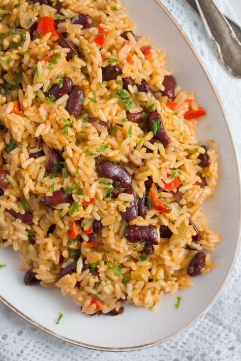 Easy Jamaican rice and peas or rice and beans recipe, quick to make a source of proteins. #whereismyspoon #riceandpeas #riceandbeans #jamaicanriceandpeas #jamaicanriceandbeans Jamaican Rice And Beans, Jamaican Rice And Peas Recipe, Easy Red Beans And Rice, Caribbean Rice And Beans, Rice And Peas Recipe, Jamaican Rice And Peas, Jamaican Rice, Rice And Beans Recipe, Peas Recipe