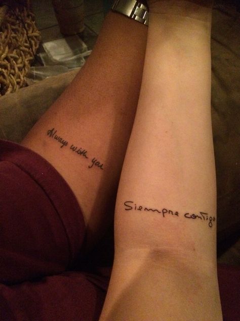 My husband and my 15 year anniversary tattoos. My handwriting on him, his on me. His tat in English (I'm American) mine in Spanish (he's from Argentina). Always with you. Mom And Daughter Tattoos Spanish, Mom And Daughter Tattoos Matching Spanish, Spanish Sister Tattoos, Mother Daughter Tattoos Spanish, Spanish Matching Tattoos, Spanish Couple Tattoos, Spanish Writing Tattoo, Always With You Tattoo, Siempre Contigo Tattoo